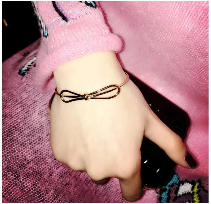 Elegant knotted O-type metal openwork bracelet in various colours