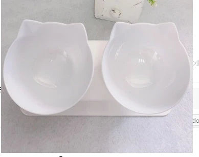Elevated tilted pet bowl with non-slip stand in transparent, white, and black color options