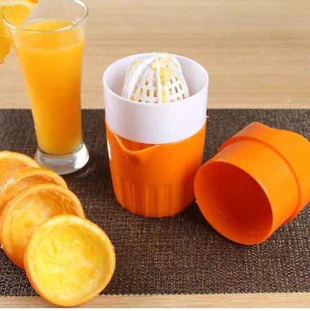 Premium manual citrus juicer with 300ml capacity, made of durable plastic and available in orange and pink colours