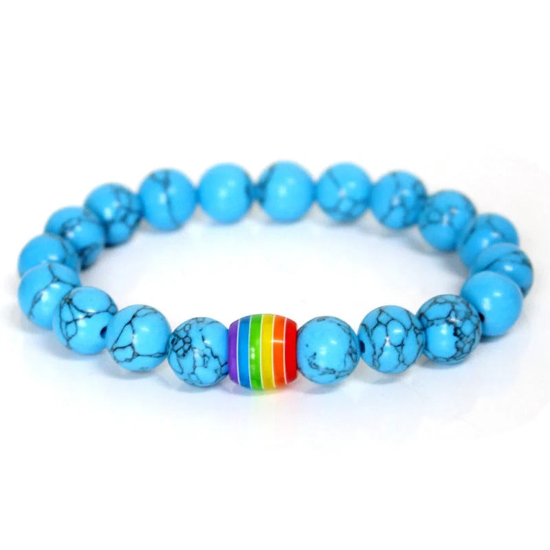 Pride Rainbow Bead Bracelet featuring natural stones in vibrant colours, perfect for unisex wear.
