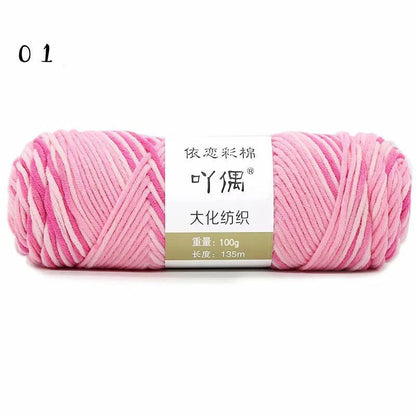 Luxurious gradient milk cotton yarn balls in a variety of vibrant colours, perfect for knitting, weaving, and other textile crafts.
