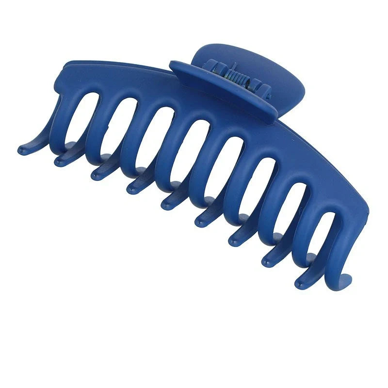 Candy-coloured plastic ponytail clip for showers and daily hair styling