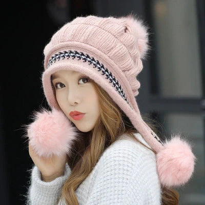 Knit fleece beanie with ear flaps and pompom in various colours for winter warmth