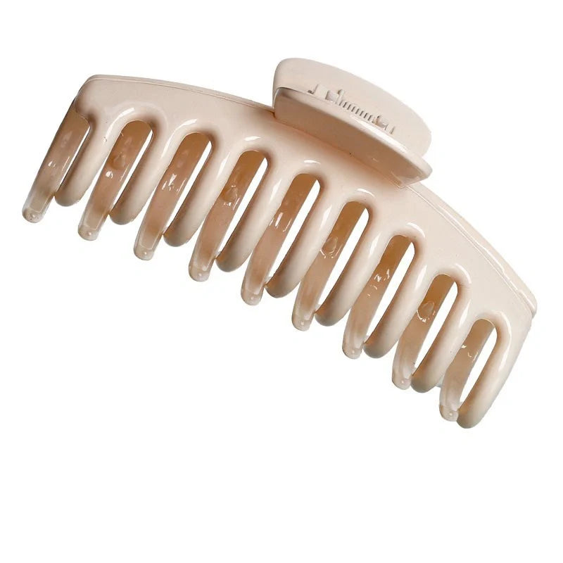 Candy-coloured plastic ponytail clip for showers and daily hair styling