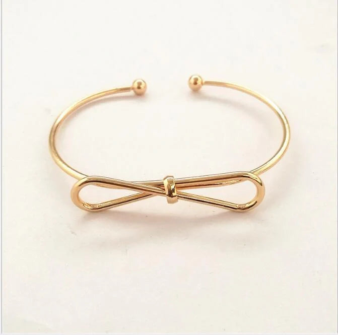 Elegant knotted O-type metal openwork bracelet in various colours