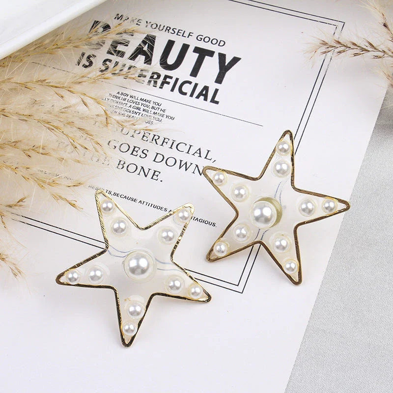 Charming peach heart and star stud earrings with elegant design and quality materials
