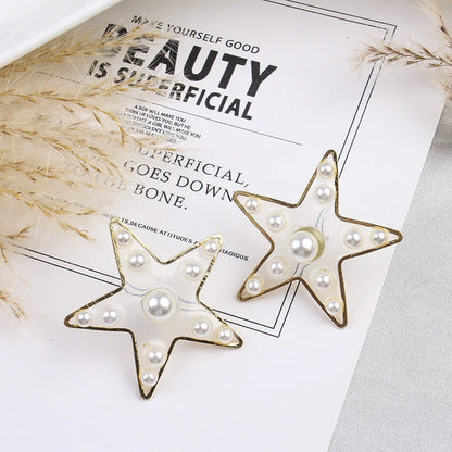 Charming peach heart and star stud earrings with elegant design and quality materials