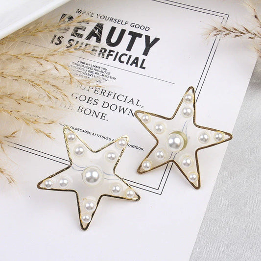 Charming peach heart and star stud earrings with elegant design and quality materials