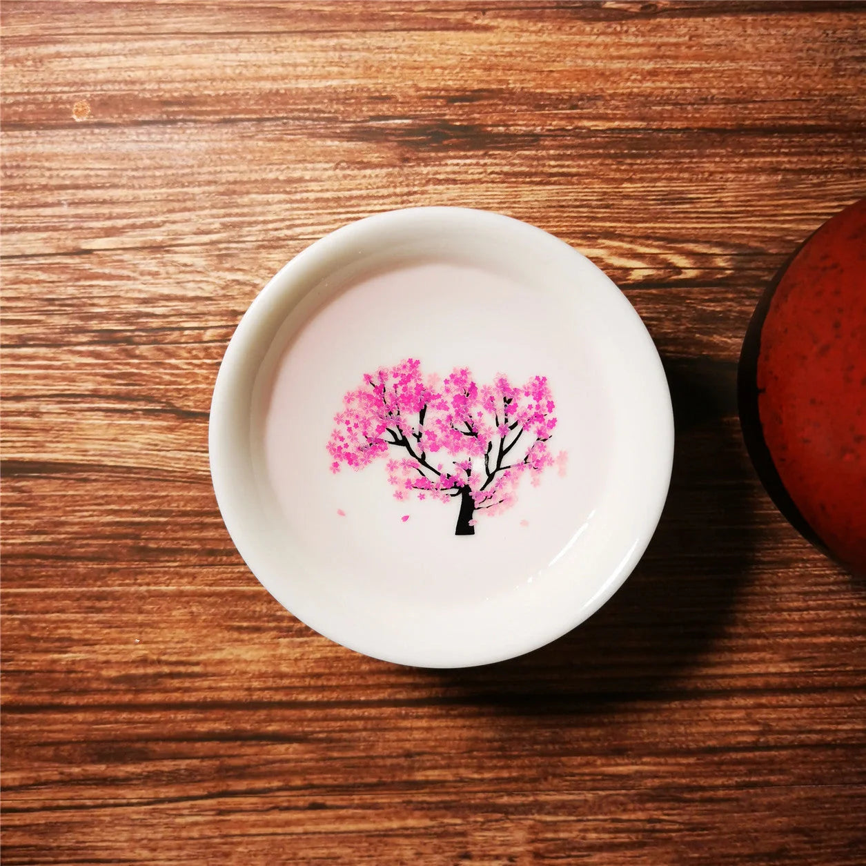 Magic Sakura Cup - Ceramic tea cup with temperature-sensitive sakura design