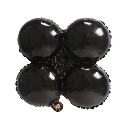 Spooky Halloween balloon decorations featuring pumpkins and bats in various styles