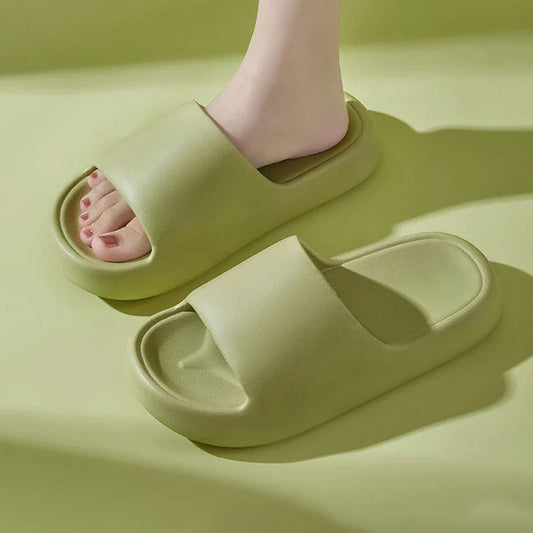 Comfortable EVA foam slip-on slippers in various colors, featuring non-slip soles and a breathable design for indoor and bathroom use.