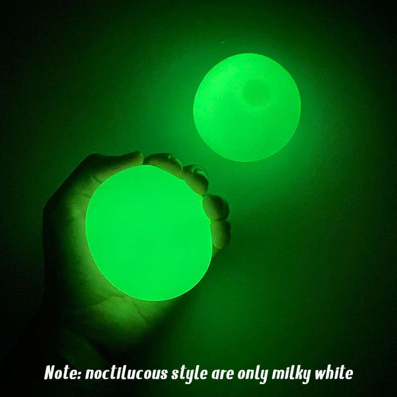 Premium Luminous Sticky Stress Relief Balls in various colors and sizes, with a glow-in-the-dark feature for a captivating and soothing relaxation experience.