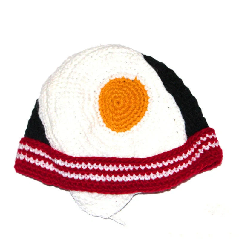 Hand-knitted egg hat in white with stripe pattern, perfect for winter and parties