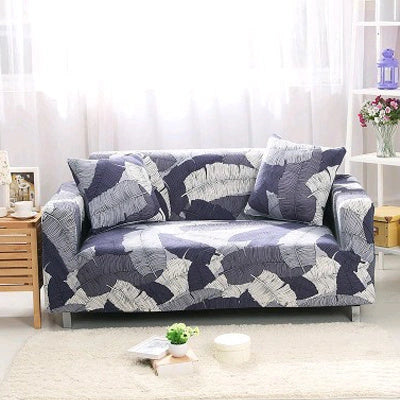Stretchable geometric print sofa cover on a three-seater sofa