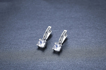 Inlaid Copper-plated Square Zircon Earrings in black with a modern geometric design