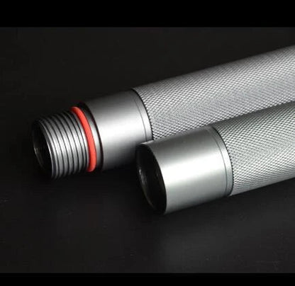 Durable tactical hiking stick with integrated survival tools, including a knife, bottle opener, and compass, for outdoor adventures and emergencies.