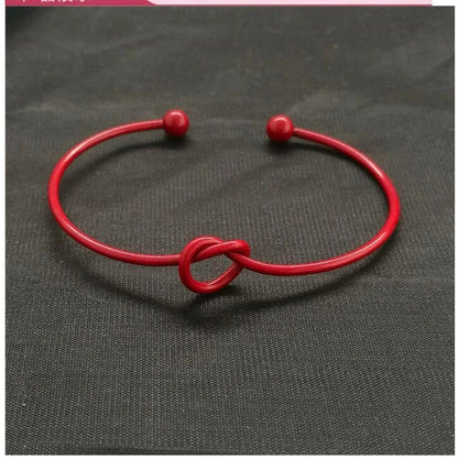 Elegant knotted O-type metal openwork bracelet in various colours