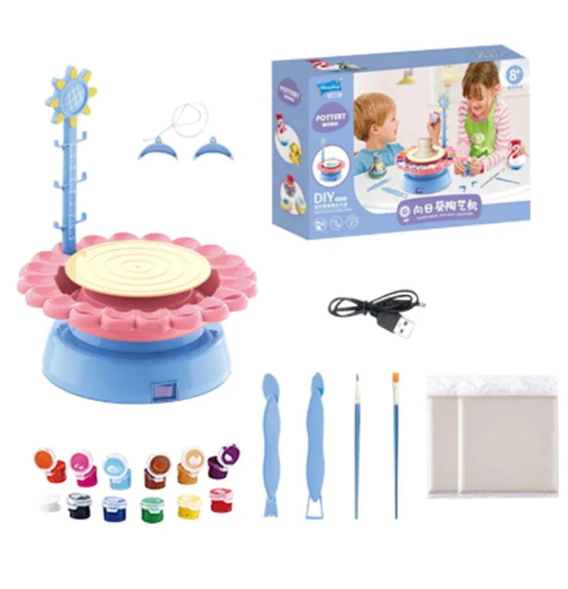 A blue electric pottery wheel kit with various clay and painting accessories for making unique pottery pieces