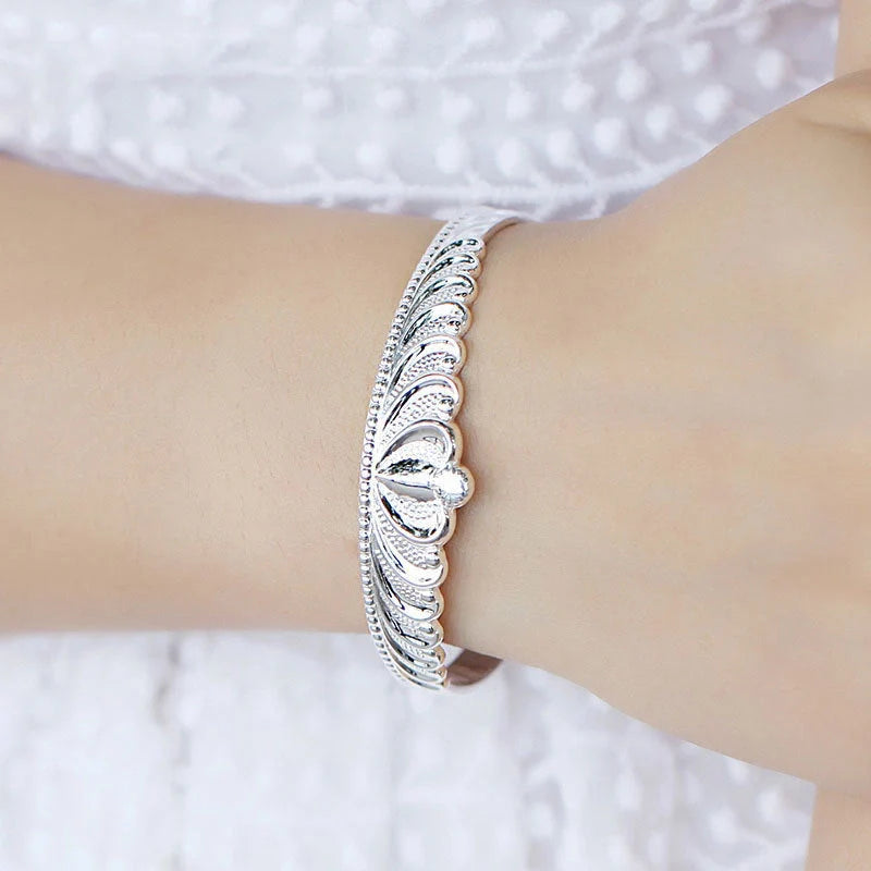Women's silver electroplated crown bracelet with detailed design
