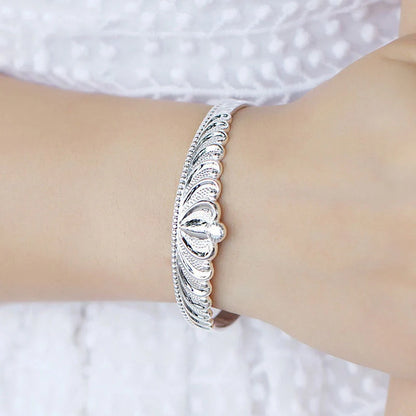 Women's silver electroplated crown bracelet with detailed design