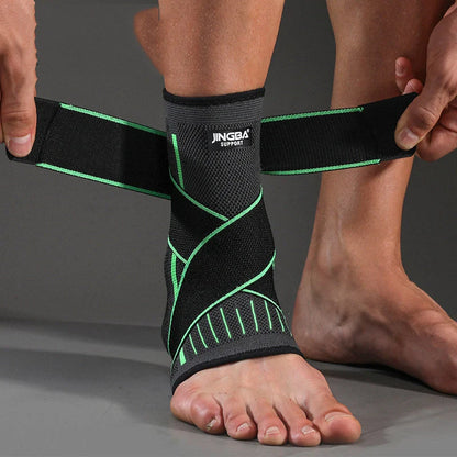 Sports compression ankle protector in black, green, and orange colours