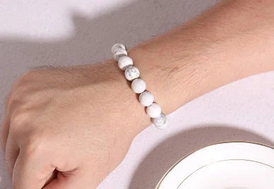Natural Black Lava Rock and White Stone Stretch Bracelet showcasing unique natural stone beads