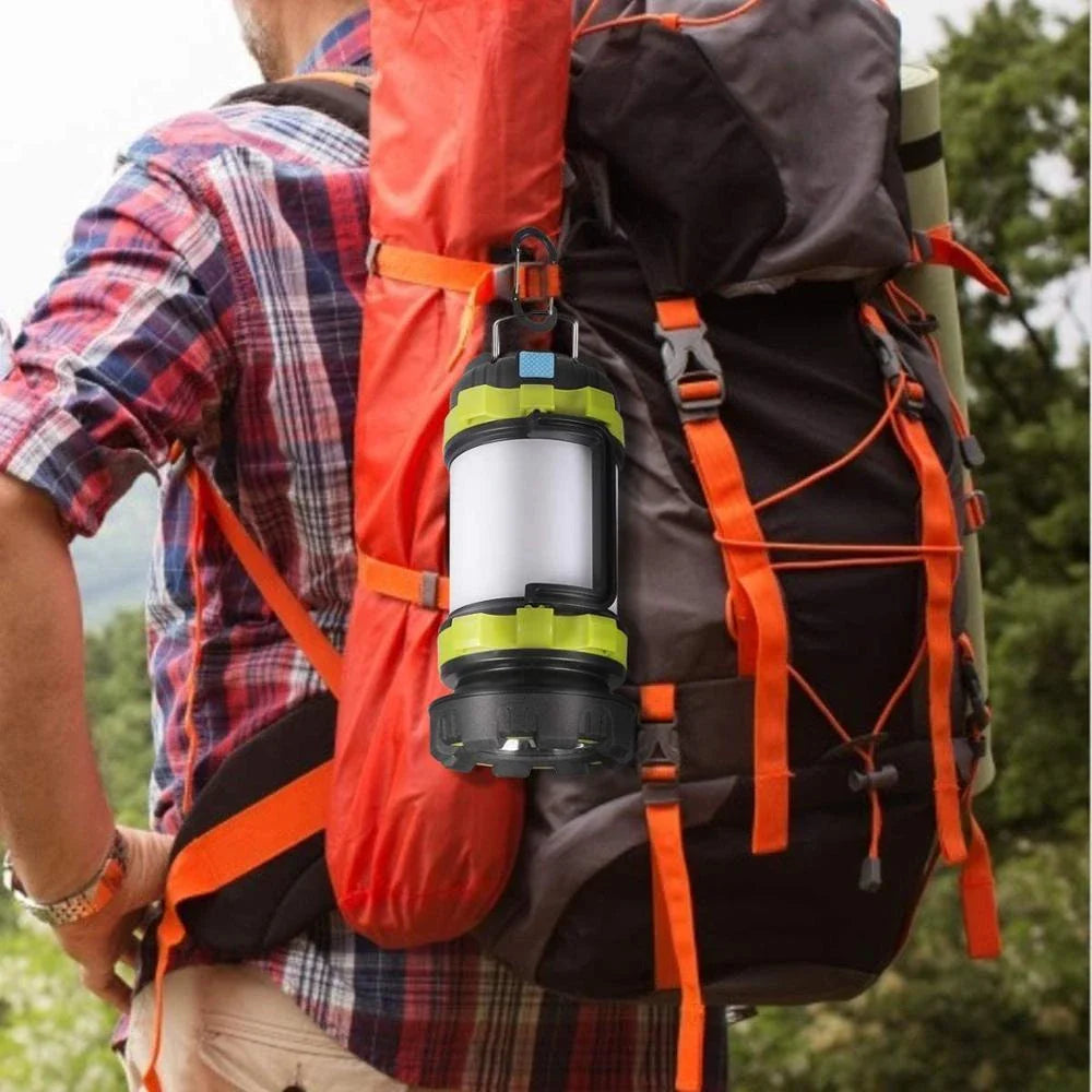 Versatile outdoor camping torch with rechargeable battery, dual lighting modes, and integrated power bank