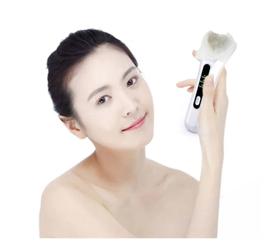 Electric Ultrasonic Facial Beauty Device in white, compact and efficient for daily skincare