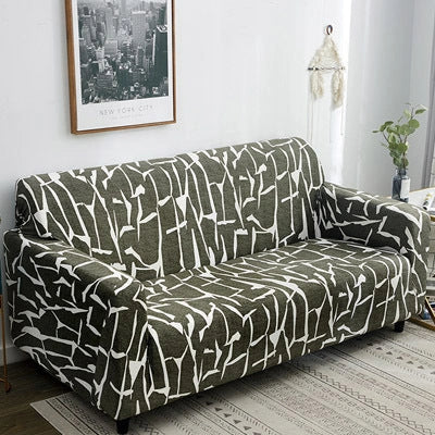 Stretchable geometric print sofa cover on a three-seater sofa
