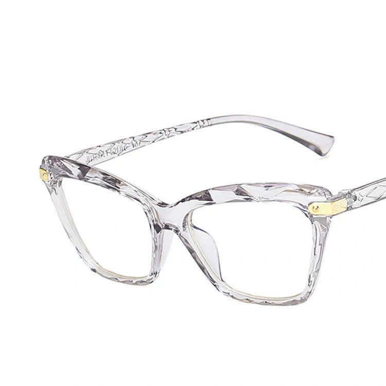 Women's anti-blue light cat eye glasses in transparent pink, bright black, transparent grey, and transparent tea