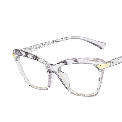 Women's anti-blue light cat eye glasses in transparent pink, bright black, transparent grey, and transparent tea