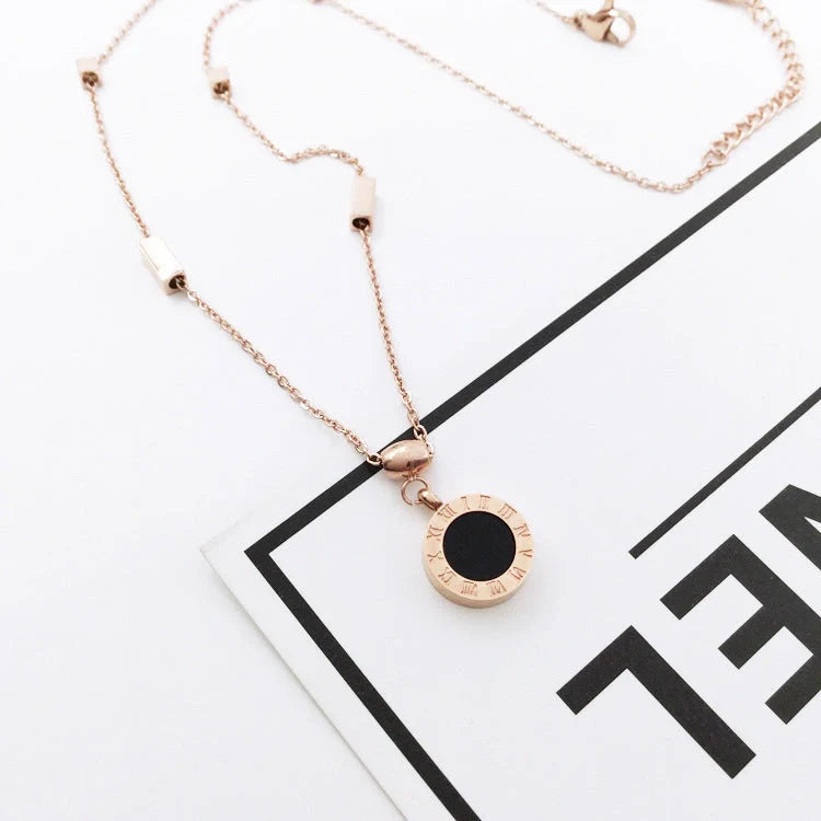 Elegant 18K rose gold titanium steel necklace with double-sided Roman numeral design