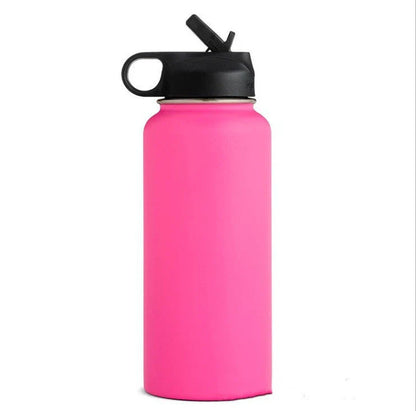 Premium stainless steel insulated tumbler with push-button lid and sleek design for outdoor adventures and active lifestyles.