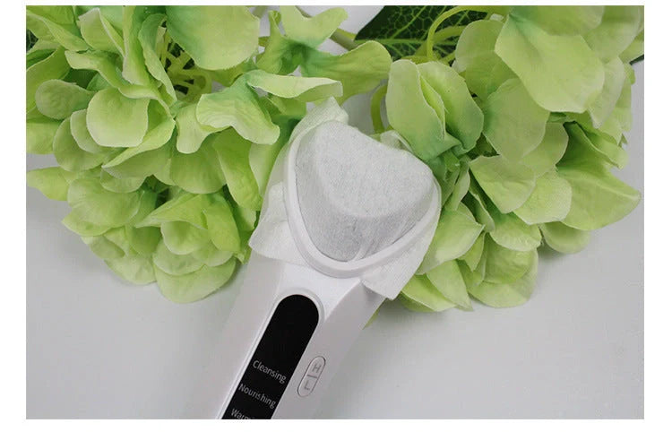 Electric Ultrasonic Facial Beauty Device in white, compact and efficient for daily skincare