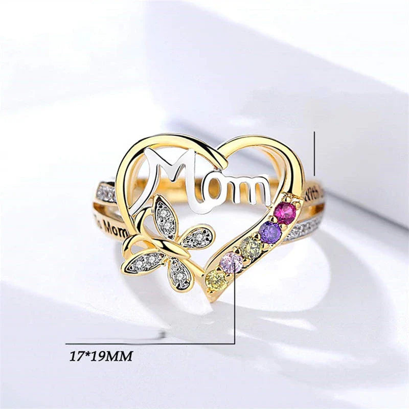 Elegant rhinestone heart-shaped ring in gold color with a dazzling array of multicolored rhinestones