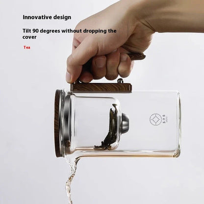 Smart one-button magnetic tea infuser pot with wooden handle, featuring heat-resistant borosilicate glass construction and seamless tea brewing experience.