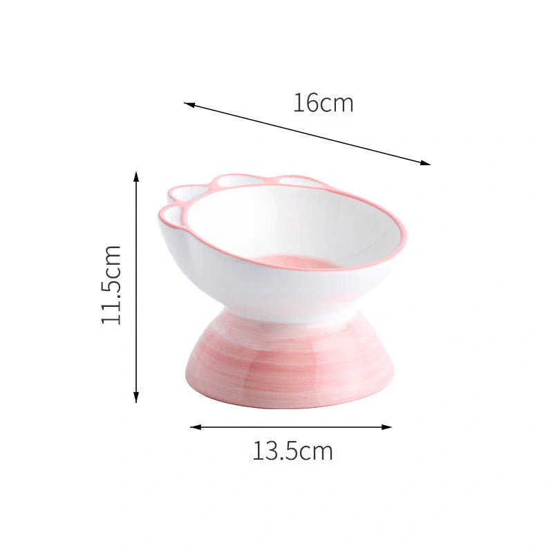 Ceramic pet bowl with 15-degree incline design in pink, green, and blue