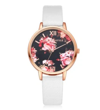 Rose gold quartz wrist watch with leather strap for women