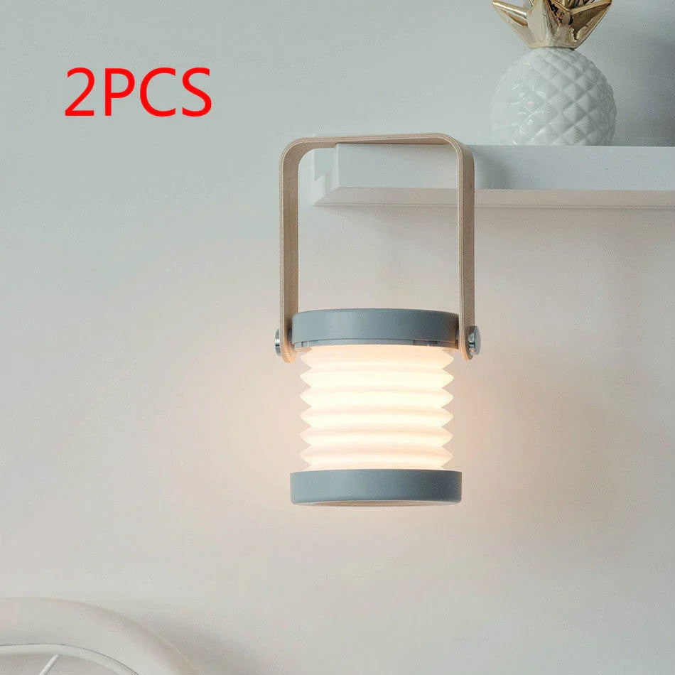 Elegant foldable LED lamp with touch-controlled dimming, rechargeable battery, and modern design for home decor