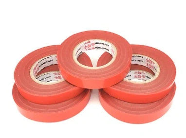 Compact garden hand tool for tying plant stems with plastic tape, measuring 300x200x100mm