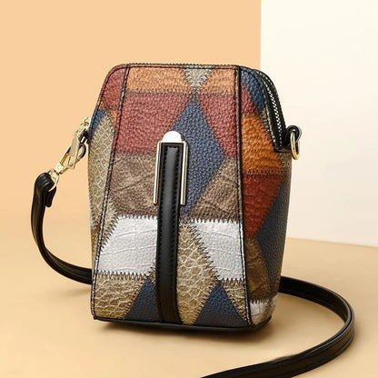 Stylish leather shoulder bag with distinctive stitching and versatile design for everyday wear