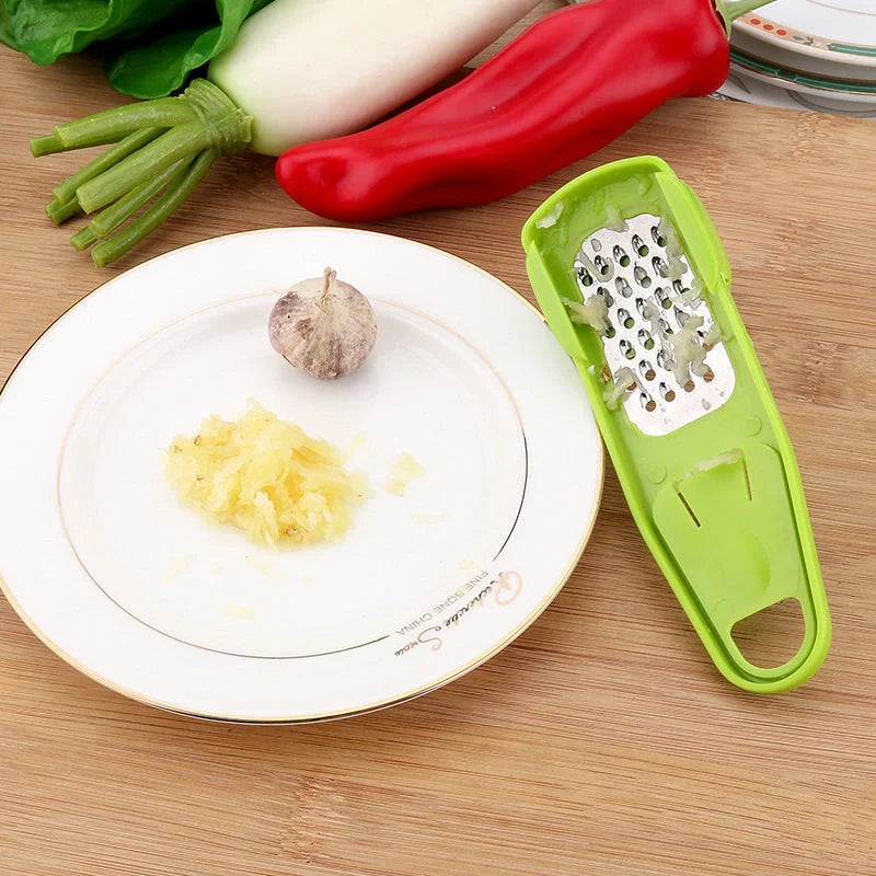 Eco-friendly garlic press and seasoning grinder in rose and green