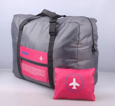 Foldable nylon travel holdall in various colours, including black, orange, green, and red