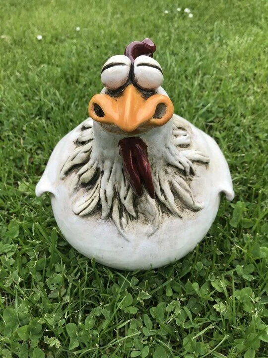 Charming resin chicken garden ornament with vibrant colours and playful design, perfect for adding a whimsical touch to outdoor spaces