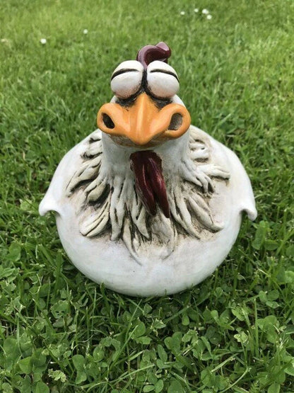 Charming resin chicken garden ornament with vibrant colours and playful design, perfect for adding a whimsical touch to outdoor spaces