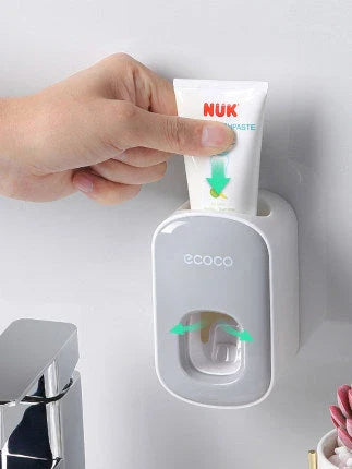 Wall-mounted automatic toothpaste dispenser with storage cups for toothbrush and bathroom accessories