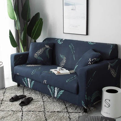 Stretchable geometric print sofa cover on a three-seater sofa