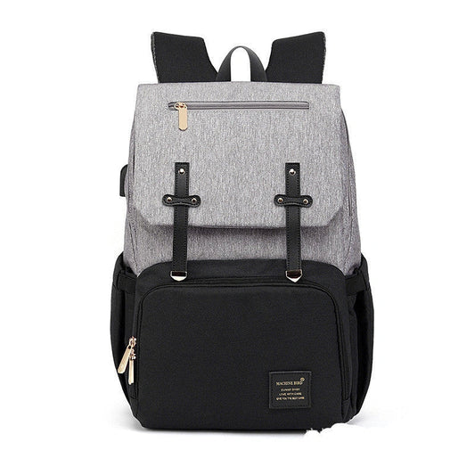 Versatile mummy bag with stroller hooks, side pockets, and zippered compartments for storing baby essentials