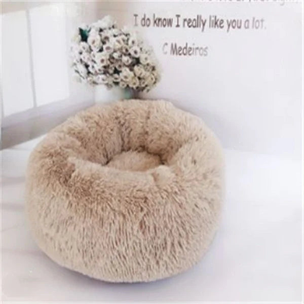 Cosy round plush cat mattress for winter warmth, available in various colours and sizes