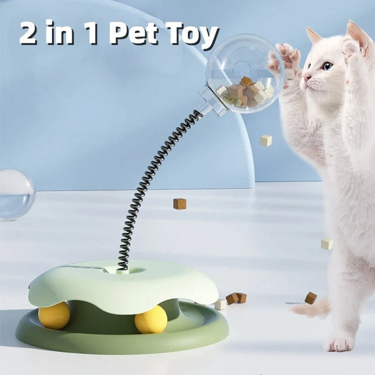 Interactive cat toy with treat dispenser and spring ball in blue, yellow, green